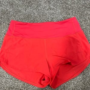 Lululemon Speed Up High Rise 2.5 inch Shorts in Carnation Red
